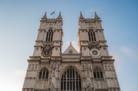 Main facade of Westminster Abbey against blue sky, Gothic style, in London, England, United Kingdom. High quality photoの写真素材