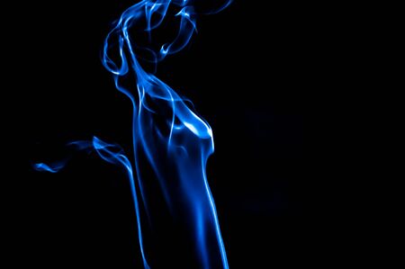 Smoke collection of solid and liquid particulates and gases emitted when a material undergoes combustionの写真素材