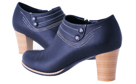 dark blue womanish boots isolited on white backgroundの写真素材