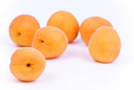 Some fresh apricot isolated on white backgroundの写真素材