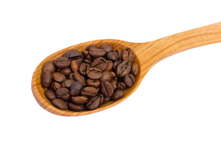 Wooden spoon with coffee beans on white backgroundの写真素材