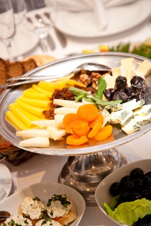 Departure service on an event.By CU dish with cheese and dry fruitの写真素材