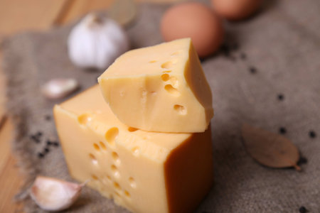 two pieces of fresh cheese with eggs, garlic and pepper