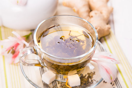 green fresh tea with a ginger, sugar and flowerの写真素材