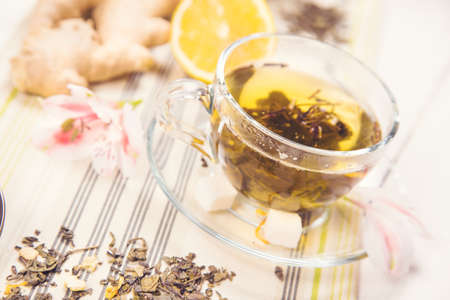green fresh tea with a ginger, sugar and flowerの写真素材
