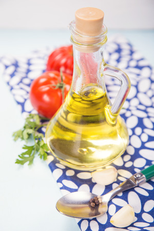 oil with parsley, garlic, tomatoes , in a studioの写真素材
