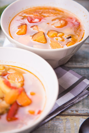fresh soup with mussels,parsley and pepperの写真素材