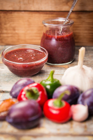 fresh tkemali sauce from plums,pepper and other vegetables in studioの写真素材