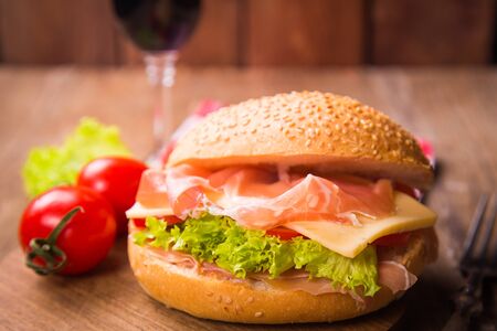 sandwich with ham,tomatoes and fresh lettuce in studioの写真素材