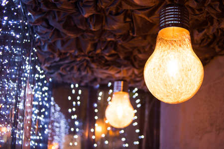 beautiful, mysterious luminous lamp and elements is in an interiorの写真素材