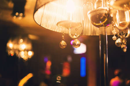 beautiful, mysterious luminous lamp and elements is in an interiorの写真素材