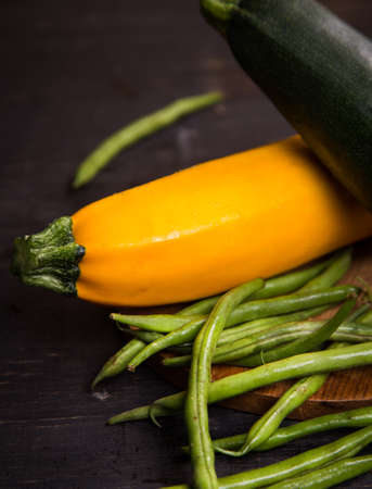two fresh ripe raw wet vegetables zuccini  in studioの写真素材