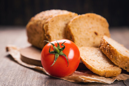 fresh tomato bread with sesame and fresh red tomatoes
