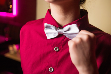 new elegance silver  bow tie on adult man indoorの写真素材