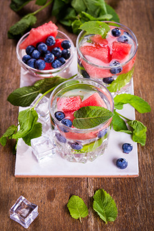 Refreshing drink with mint,water melon and blueberry for health lifeの写真素材