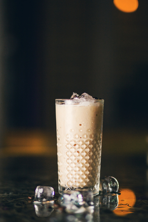 Refreshing cold frappe coffee with ice in restaurantの写真素材