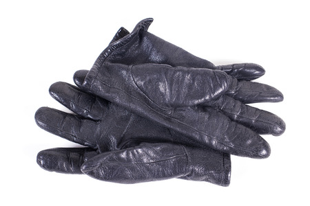black leather gloves isolated on white backgroundの写真素材