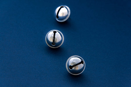 three bells on blue background