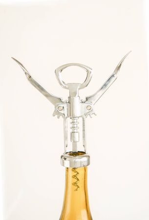 Open Hands of the opener on top of the Bottleの写真素材