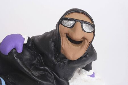 Close up of funny witch in a white background.の写真素材