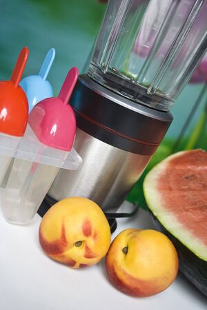 Ready to make with different fruits ice poles in the kitchen.の写真素材