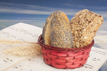 Representation oh the bread miracle, spykes and a sheet of music.の写真素材