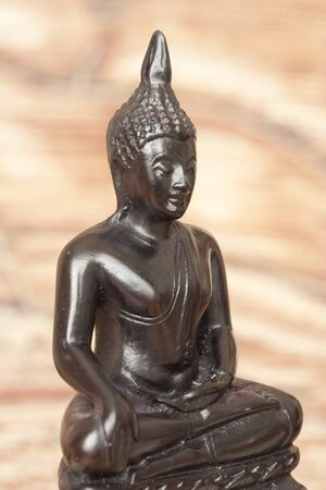 Silhouette of Buddha in a meditation position.の写真素材