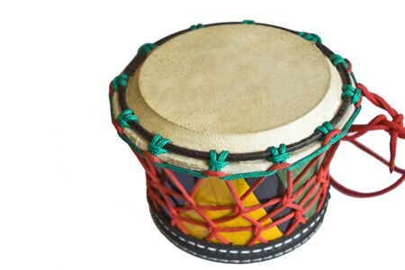 Small drum of african origin on white background.の写真素材