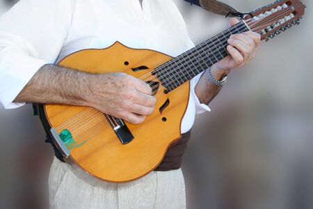 Man playing a musical instrument in a festival of music.の写真素材