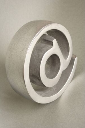 Three dimension symbol of the At on gray backgroundの写真素材