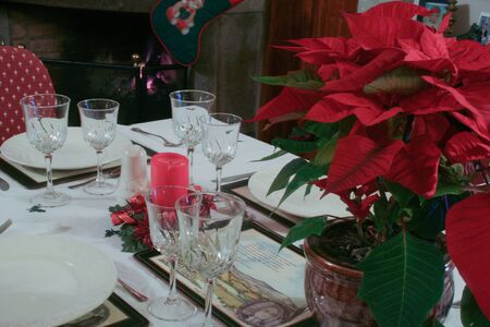 Table ready for having with the family the christmas diner.の写真素材