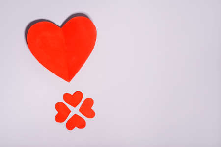 Big red heart and small hearts on gray backgroundの写真素材