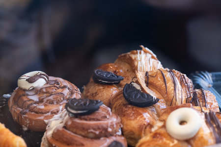 Various puff pastry sweets, on a blurred backgroundの写真素材