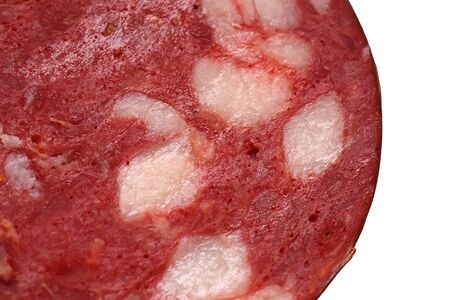 juicy piece of sausage close up.Isolated on white backgroundの写真素材