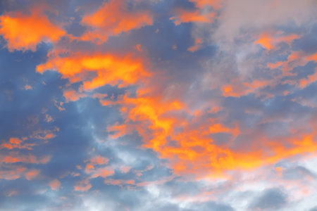 Sky and clouds at sunset. Cumulus Cloudscape. Sunset sky
