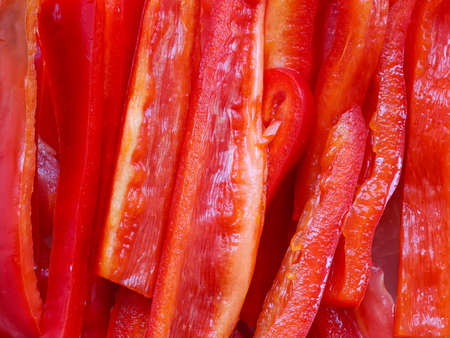 Sliced red bell peppers. Food background. Close upの写真素材
