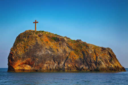 Serene view of Saint George rock island. Cross on the Saint George, cape Fiolent, Crimeaの写真素材