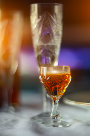 Served dinner table in a restaurant. Restaurant interior. Defocused backgroundの写真素材