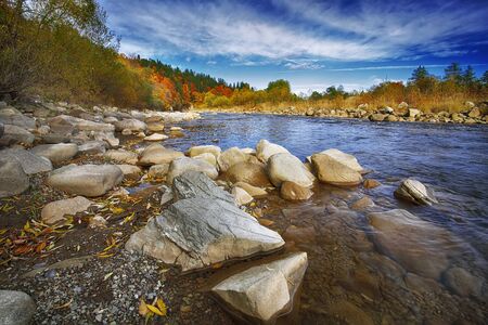 rocky shore of the river. Autumn timeの写真素材