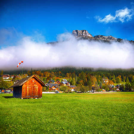 sunny morning on Altaussee village. Sunny autumn scene in the morning. Location: resort village Altaussee, Liezen District of Styria, Austria, Alps. Europe.の写真素材