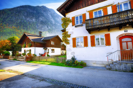 Scenic view of famous Hallstatt mountain village with Hallstatter lake.Typical Austrian Alpine houses with bright flowers. Location: resort village Hallstatt, Salzkammergut region, Austria, Alps. Europe.の写真素材