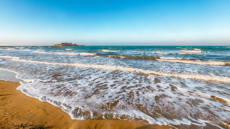 Colorful spring seascape on the Passero cape Sicily. Dramatic morning and gorgeous scene. Island Sicilia, cape Passero, Italy, Europe, Mediterranean sea.の写真素材