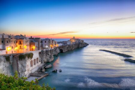 Vieste - beautiful coastal town on the rocks in Puglia. The church of San Francesco di Vieste. Gargano peninsula, Apulia, southern Italy, Europe.の写真素材