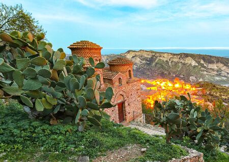 Sunrise over old famous medieval village Stilo in Calabria. View on church and city. Southern Italy. Europe.の写真素材