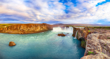 Incredible landscape scene of powerful Godafoss waterfall. Dramatic sky over Godafoss. Location: Bardardalur valley, Skjalfandafljot river, Iceland, Europeの写真素材