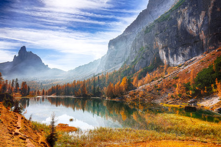 Fantastic autumn landscape. View on Federa Lake early in the morning at autumn. Location: Federa...