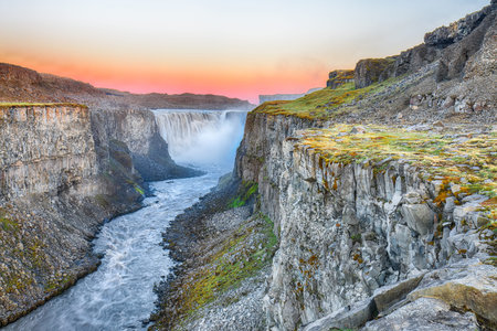 Marvelous sunrise view  of the most powerful waterfall in Europe called Dettifoss. Location: Vatnajokull National Park,  river Jokulsa a Fjollum, Northeast Iceland, Europeの写真素材