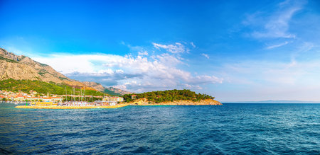 Splendid View of the resort town of Makarska on a summer day with picturesque harbor. Location:...