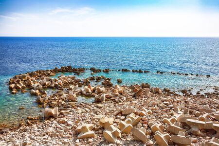 Huge boulders on the beach in Petrovac bay, on the coast in Montenegro Location: Petrovac town, Montenegro, Balkans, Europeの写真素材