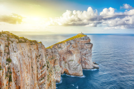 Fantastic morning view on Cacccia cape Lighthouse. Fantastic  Mediterranean seascape. Location: ...